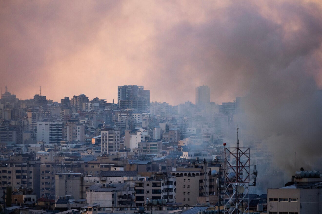 Smoke rises after an Israeli airstrike targeting Hezbollah terrorist assets in Beirut's southern suburbs, March 9, 2026. Photo by Daniel Carde/Getty Images.