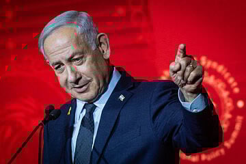 Israeli Prime Minister Benjamin Netanyahu speaks at the Jewish News Syndicate conference in Jerusalem, April 27, 2025. Credit: Yonatan Sindel/Flash90. Netanyahu
